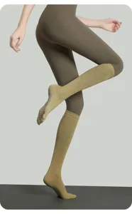 Knee-high five-toe yoga socks with anti-slip grip and breathable diamond pattern design.