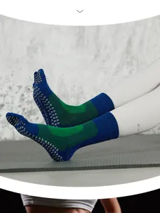 Detail view of non-slip five-toe yoga socks with grip soles for indoor fitness pilates.
