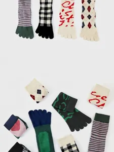 Detail view of cotton non-slip five-finger yoga socks with colorful patterns and stripes.
