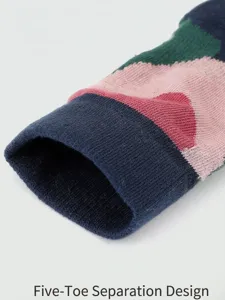 Detail shot of cotton yoga toe socks cuff, multi-color striped design, breathable knit texture.