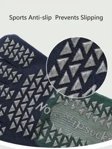 Detailed view of non-slip five toe yoga socks with triangular grips for fitness and pilates.