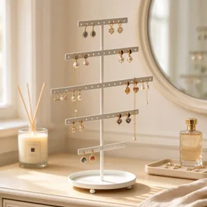 White 5-tier metal earring holder display stand with tray for jewelry organizer storage.