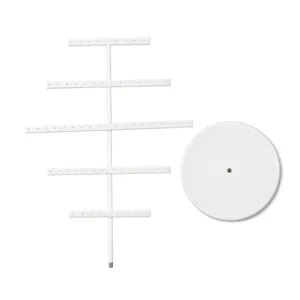 White metal tiered earring display stand, detachable jewelry holder for home store use.