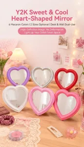 Heart-shaped makeup mirror for desktop and wall hanging with colorful macaron frame design.