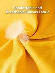Yellow canvas material detail of breathable pet bag, durable fabric for comfortable travel.