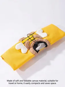 Foldable canvas pet carrier bag with cute bee design, portable pet travel bag detail view.