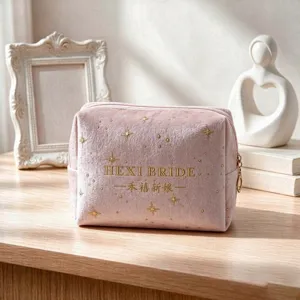 Pink velvet cosmetic bag with gold foil stars, portable zip makeup storage pouch for travel.