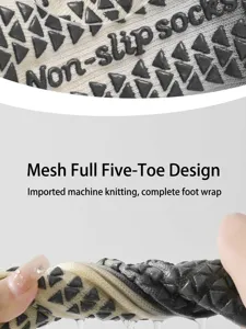 Detailed view of non-slip five-toe yoga socks with grip dots for stable indoor workouts.