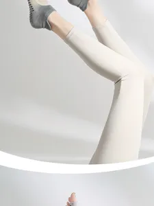 Women's non-slip yoga socks and leggings set, perfect for pilates, fitness and indoor workouts.