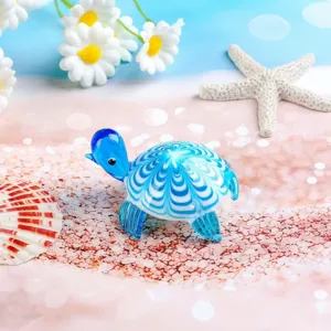 Blue glass sea turtle figurine detail shot, micro landscape ornament for fish tank.