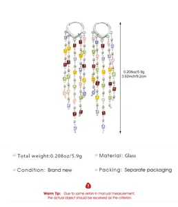 Elegant long fringe drop earrings featuring colorful glass beads and heart-shaped huggie tops.