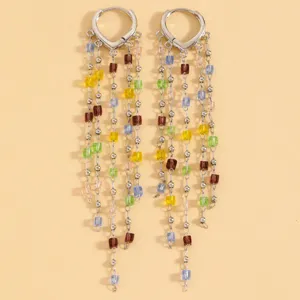 Long multi-strand tassel earrings with colorful square beads and silver-tone metal hoop style.