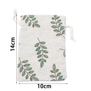 Detailed view of the linen drawstring pouch featuring a green leaf botanical print design.