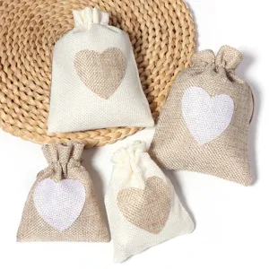 Linen drawstring gift bags with cute heart pattern, perfect jewelry pouch and herbal sachet.