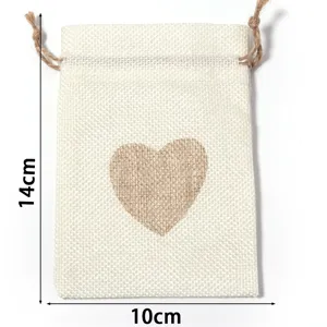 Linen drawstring pouch detail view showcasing the cute heart pattern and size dimensions.