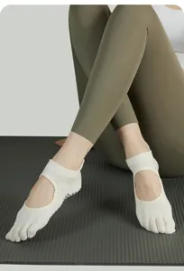 Non-slip five toe yoga socks for women, breathable open top pilates and fitness grip socks.