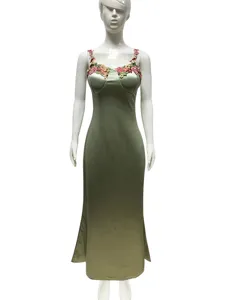 Elegant olive green satin slip dress featuring delicate floral embroidery on straps and bodice.