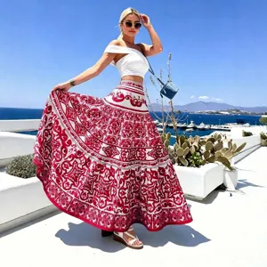 Women fashion printed beach maxi skirt set, chic summer resort wear with elegant red white design.
