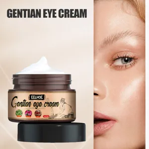 Vue rapprochée du pot de crème pour les yeux à la gentiane avec texture blanche et modèle.