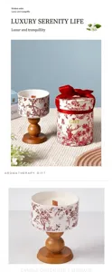 Exquisite scented soy wax candle in ceramic holder with red toile de jouy print and gift box.