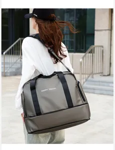 Large capacity travel duffel bag with dry-wet separation for gym and outdoor trips.