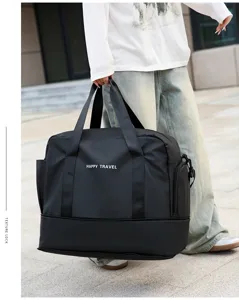 Detail view of the black travel duffle bag featuring large capacity and dry wet separation design.