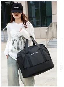 Large capacity travel duffel bag with dry wet separation and bottom shoe compartment.