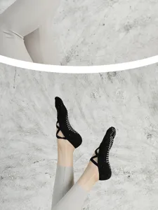 Non-slip strappy pilates socks detail view, perfect for yoga, fitness and indoor sports training.