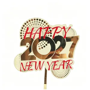 Gold mirror acrylic Happy New Year cake topper, shiny festive party dessert decoration item.