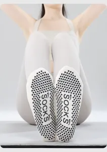 Non-slip yoga socks for women, featuring anti-skid grip dots and breathable fabric for pilates.