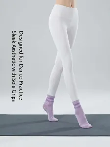 Detail view of women non-slip yoga socks for pilates, fitness and floor dancing workouts.