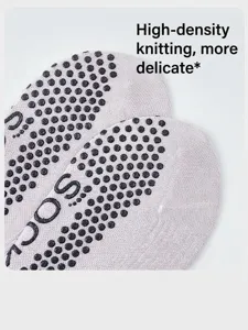 Close-up view of yoga socks with high-density knit and anti-slip dots for pilates.