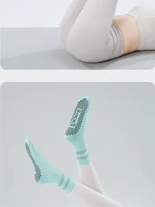 Non-slip grip yoga socks for women, breathable mid-tube pilates fitness socks with dots.