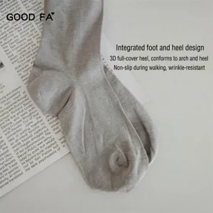 Graue Kammgarn-Strumpfhose Detailansicht, verstärktes Fersen-Design für perfekten Sitz.