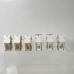 Wooden Christmas small house hanging pendant detail view, cute festive tree decoration set.