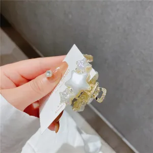 Detailed view of the Korean style star pearl hair claw clip showcasing fine alloy workmanship.