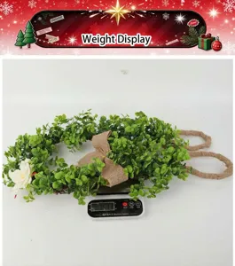 Artificial green plant wreath with white flower and burlap bow for home wall decor