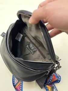 Spherical casual shoulder bag for men and women, retro crossbody bag with colorful straps.