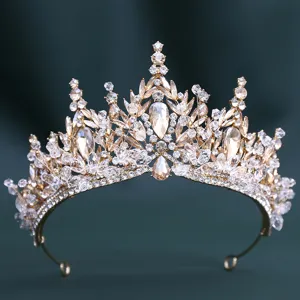 Exquisite gold bridal tiara with sparkling crystal rhinestones for wedding and party.