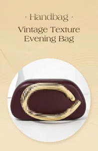 Detailed closeup view of retro evening handbag with metal handle and dark leather.
