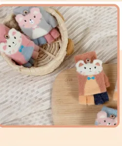 Close-up details of cute half-finger convertible knit gloves for kids in cozy baskets.