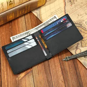 Detail view of genuine leather bifold wallet with multiple card slots and cash pocket.