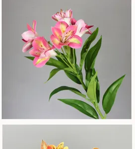 Artificial Alstroemeria flower detail, pink petals with green leaves for home decoration.