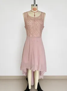 Pink lace and chiffon high-low dress detail, elegant sleeveless evening gown design.