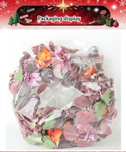 Closeup detail of autumn artificial flower wreath in transparent packaging for indoor home decoration.