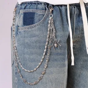 Metal pants chain detail, punk style multi-layer chain with spider pendant on denim.