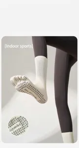 Detailed view of women's non-slip five-toe yoga socks with grip for pilates and fitness.