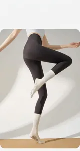Professional anti-slip yoga socks for women, pilates five-toe mid-tube athletic cotton socks.