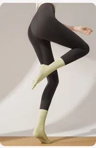 Anti-slip five toe yoga socks for women, ideal for pilates, fitness and dance training.