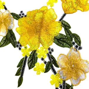 Exquisite floral lace embroidery collar detail, vibrant multi-color neckline applique craft.